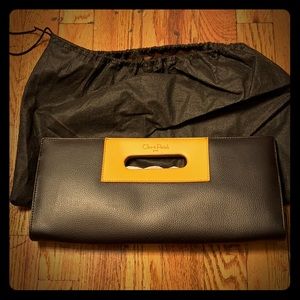Brand new Cleo and patch Paris clutch